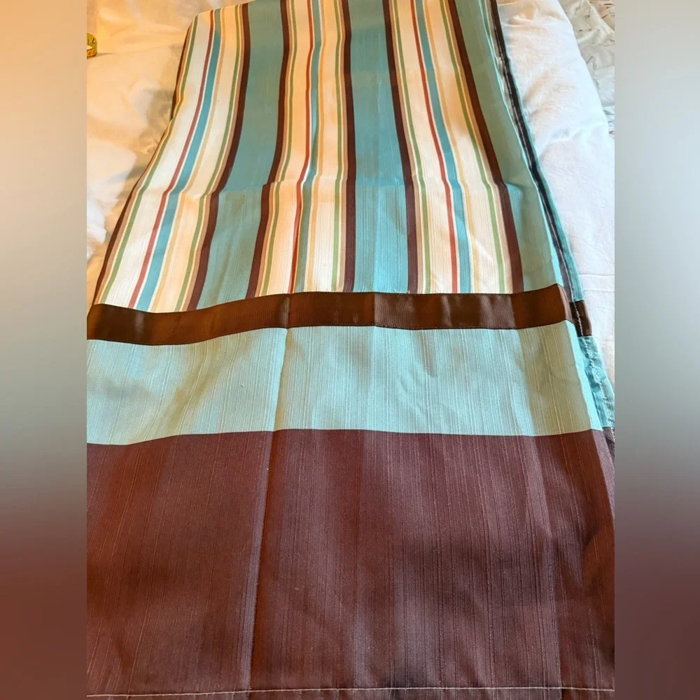 Striped fabric shower curtain with rings
